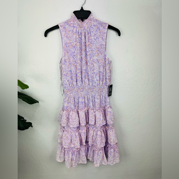 Express Printed Sleeveless Mock Neck Tiered
Ruffle Dress in lilac Purple Print - Picture 2 of 9